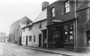A black and white image of the Torbell store on Cross street Eye Suffolk 1861 -1939